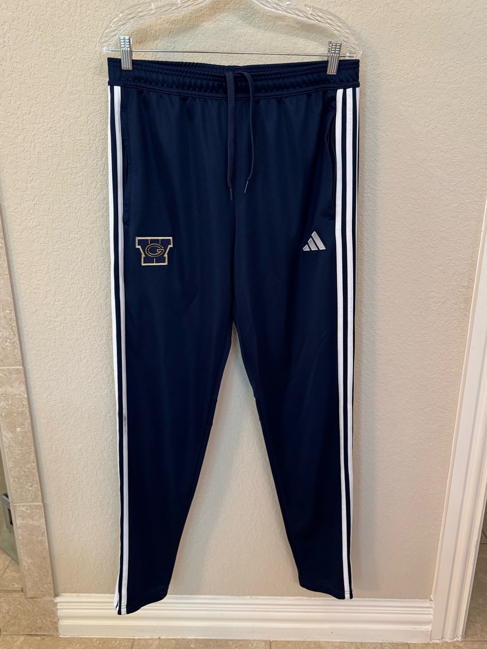 Adidas Navy Track Pants with White Stripes & GW logo. Size LT.